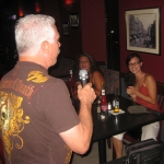 Mark singing to the ladies.