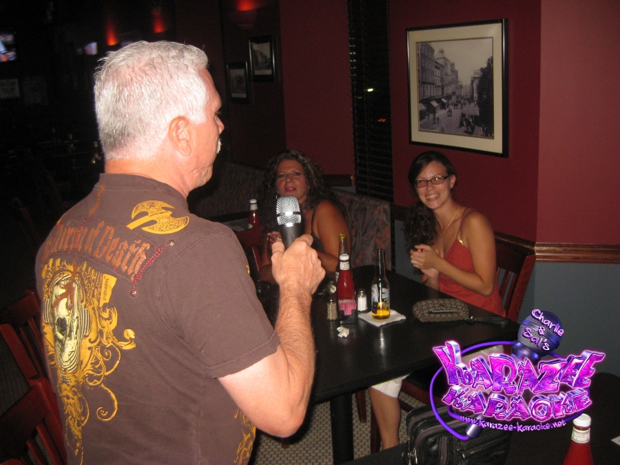 Mark singing to the ladies.